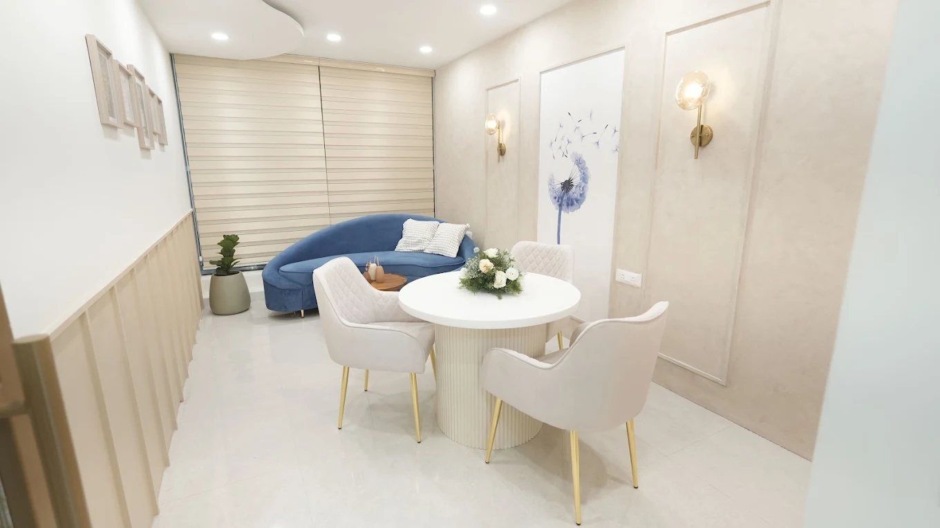 Private lounge with a round table and sofa